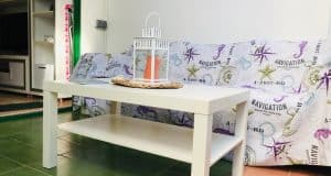 appartamento in vendita al piano terra fronte piscina nel complesso surycan zona sonnenland in gran canaria composto da una camera da letto un bagno cucina e salone più patio esterno.