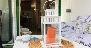 appartamento in vendita al piano terra fronte piscina nel complesso surycan zona sonnenland in gran canaria composto da una camera da letto un bagno cucina e salone più patio esterno.