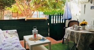 appartamento in vendita al piano terra fronte piscina nel complesso surycan zona sonnenland in gran canaria composto da una camera da letto un bagno cucina e salone più patio esterno.