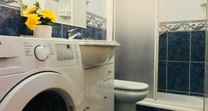 appartamento in vendita al piano terra fronte piscina nel complesso surycan zona sonnenland in gran canaria composto da una camera da letto un bagno cucina e salone più patio esterno.