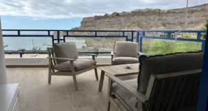Vista Taurito apartment for sale with covered terrace and outdoor dining area